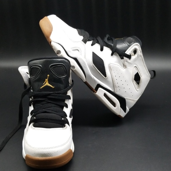 black and gold jordan flights